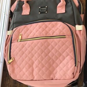 Pink diaper bag/changing station